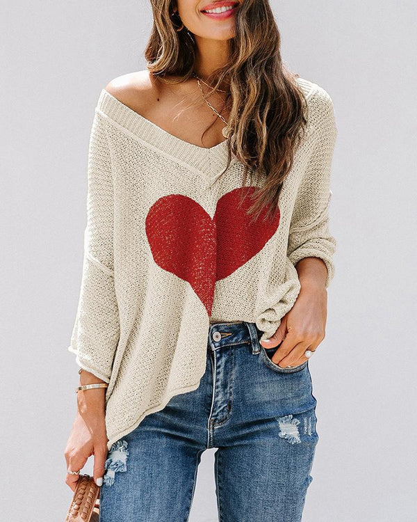 Pull en tricot à manches longues et motif coeur à manches chauve-souris