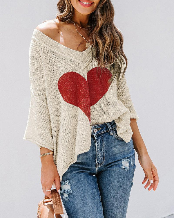 Pull en tricot à manches longues et motif coeur à manches chauve-souris