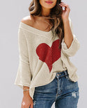 Pull en tricot à manches longues et motif coeur à manches chauve-souris