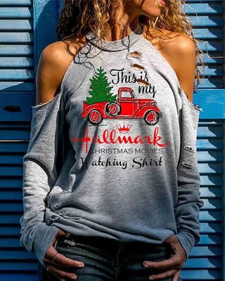 Haut à épaules dénudées à découpes et lettres de Noël