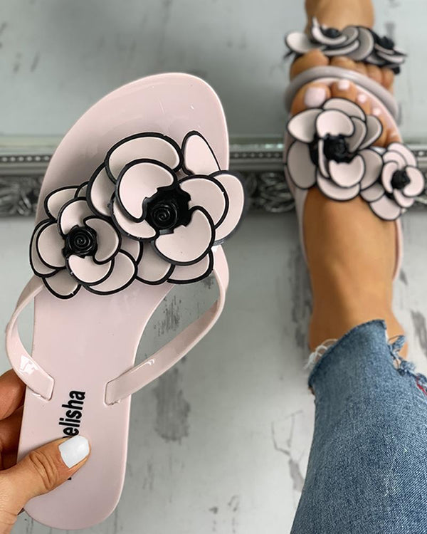 Sandales plates à bout fleuri