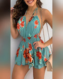 Robe moulante sans manches à imprimé floral