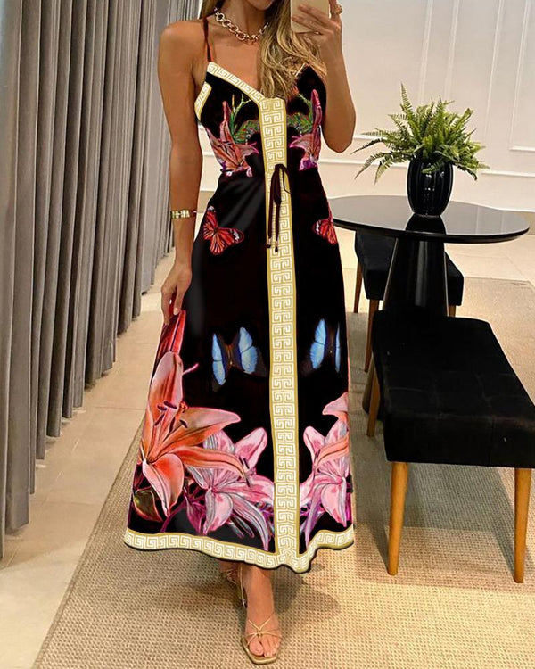 Robe longue à bretelles spaghetti à imprimé floral papillon