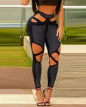 Pantalon taille haute à découpes et imprimé clouté