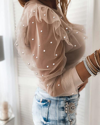 Haut à volants en maille transparente avec perles