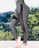 Pantalon de yoga à taille haute en maille transparente évidée