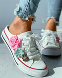 Chaussures de skate à lacets à motif floral et œillets cloutés