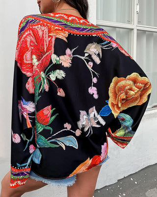 Haut à manches chauve-souris à imprimé floral