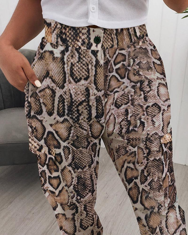 Pantalon à imprimé peau de serpent à design de poche