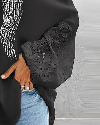 Haut brodé à œillets avec motif ailes d'angle