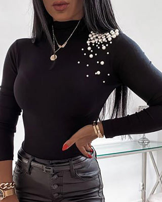 Haut à col montant à manches longues et perles