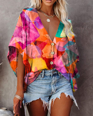 Blouson boutonné ample à manches courtes et imprimé floral