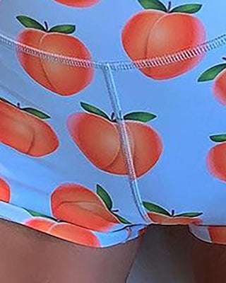 Ensemble top court uni et short taille haute imprimé pêche