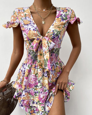 Robe évasée à manches courtes et col en V profond imprimé partout