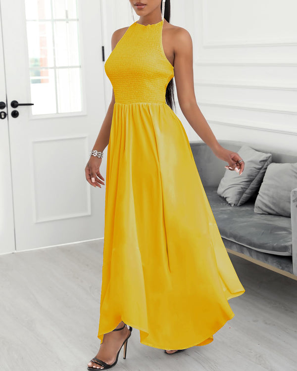 Robe longue plaine sans manches froncée