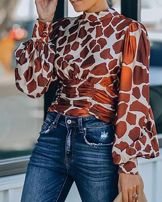 Haut à manches lanterne dos nu à imprimé guépard