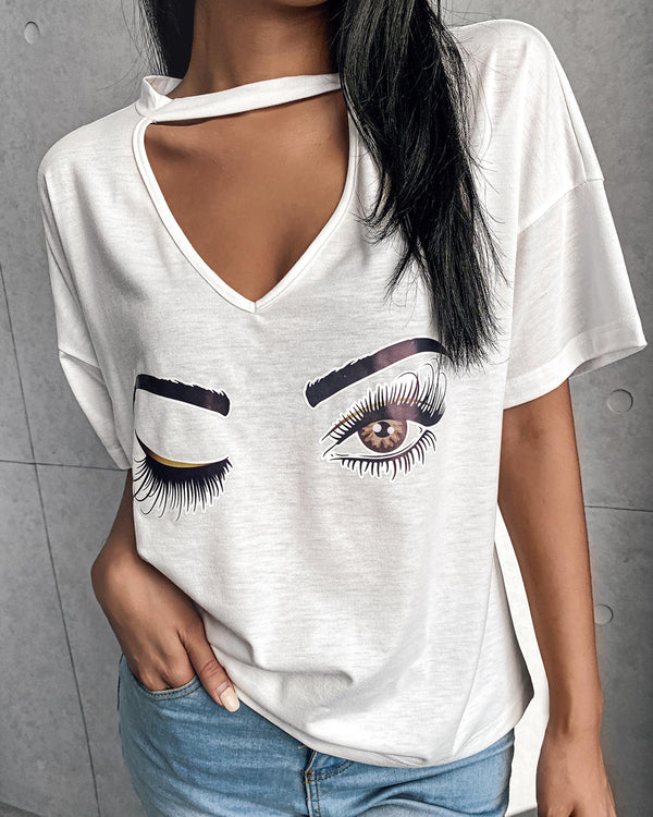 T-shirt décontracté imprimé yeux découpés sur le devant