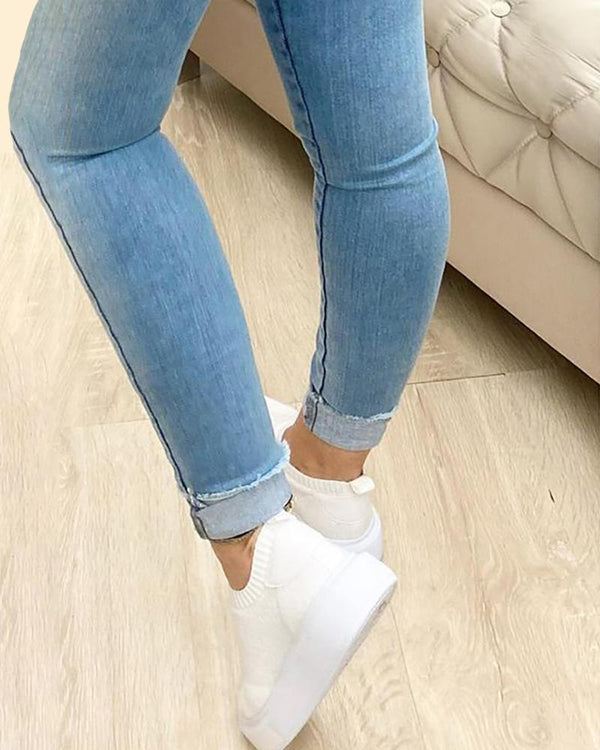 Jean skinny à poche boutonnée