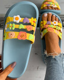 Sandales plates à bout ouvert et motif graphique floral