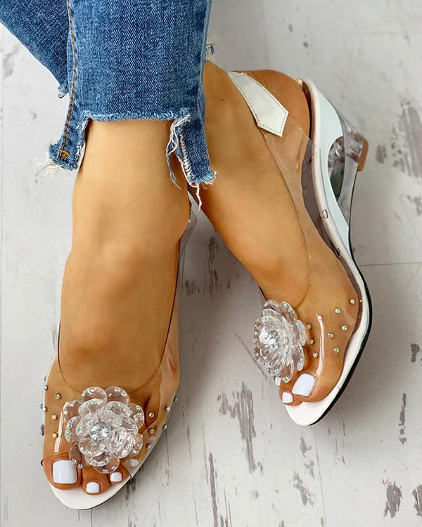Clouté fleur design sandales compensées transparentes