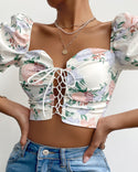 Crop top froncé à manches bouffantes et à imprimé floral