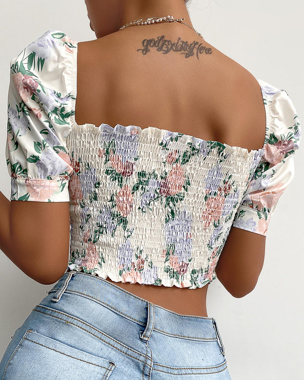 Crop top froncé à manches bouffantes et à imprimé floral