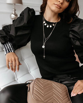 Blouse à mancherons et boutons cloutés