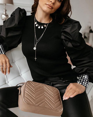 Blouse à mancherons et boutons cloutés