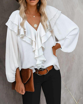 Haut uni à manches lanterne et ourlet à volants