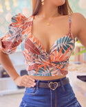 Crop top asymétrique à imprimé tropical