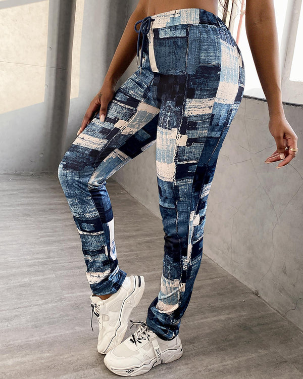 Pantalon plié taille haute avec cordon de serrage
