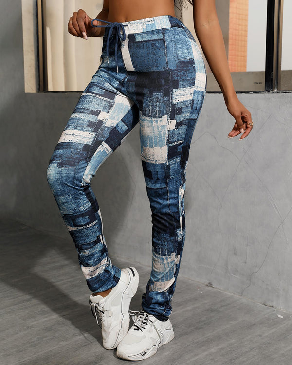 Pantalon plié taille haute avec cordon de serrage