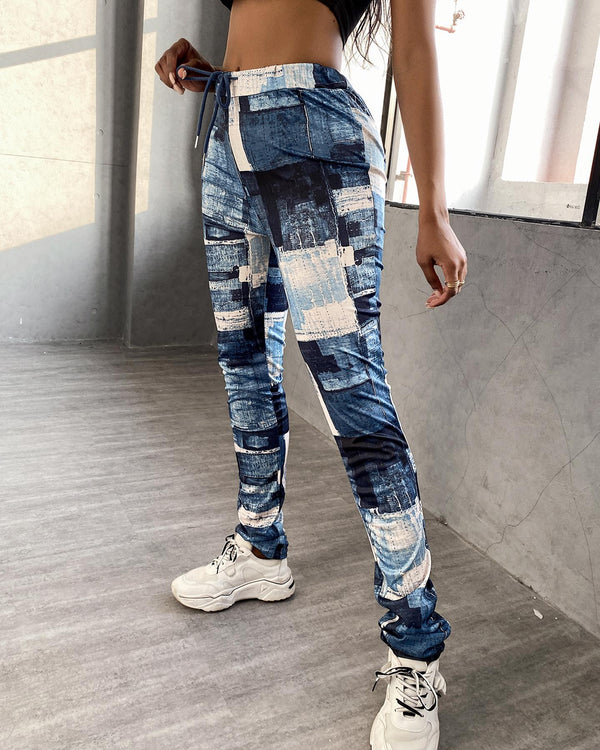 Pantalon plié taille haute avec cordon de serrage