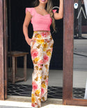 Ensemble top court à manches flottantes et pantalon à imprimé floral