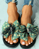 Sandales plates cloutées à motif nœud papillon Polkadot