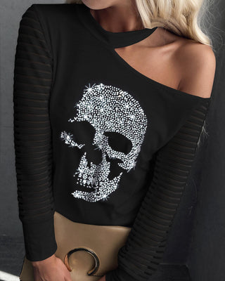 Haut à manches longues en maille à épaules dénudées et motif crâne clouté