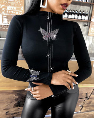 Blouse à manches longues cloutée à motif papillon