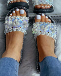 Sandales plates à motif de fleurs en perles