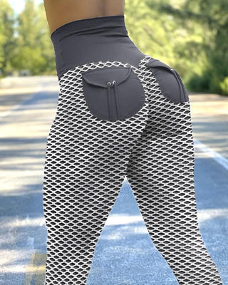 Pantalon de yoga de levage de fesses sans couture à taille haute avec poche en résille