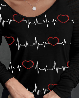 Haut à manches longues à col en V et imprimé cœur