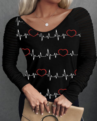 Haut à manches longues à col en V et imprimé cœur