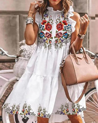 Robe décontractée sans manches à imprimé floral et ourlet volant