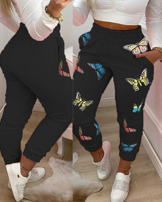 Pantalon décontracté avec poche à imprimé papillon