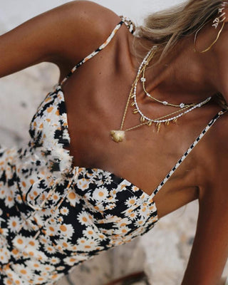 Robe à bretelles spaghetti et imprimé floral