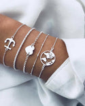 Bracelets superposés à motif d'ancre en forme de cœur et de bateau