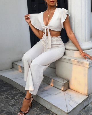 Ensemble haut noué à manches volantées et pantalon taille haute
