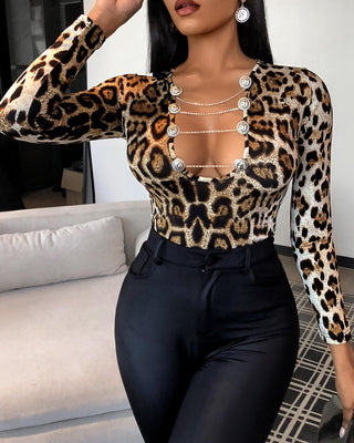Haut à boutons découpés et imprimé guépard