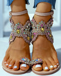 Sandales plates à motif de fleurs cloutées avec anneau d'orteil