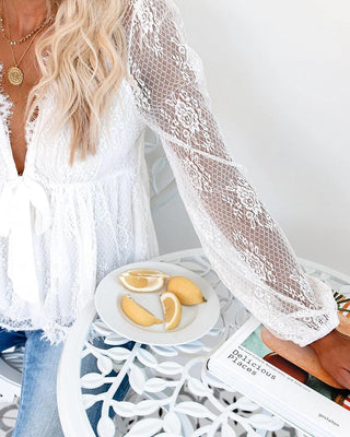 Haut en maille transparente à manches lanterne et bordure en dentelle