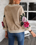 Pull moelleux à broderie florale